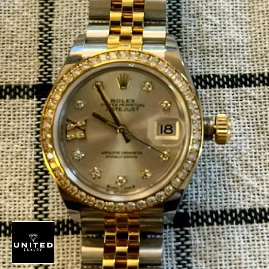 Rolex Datejust 279383RBR-0003 Champagne & Diamond Dial Jubilee Replica on the table