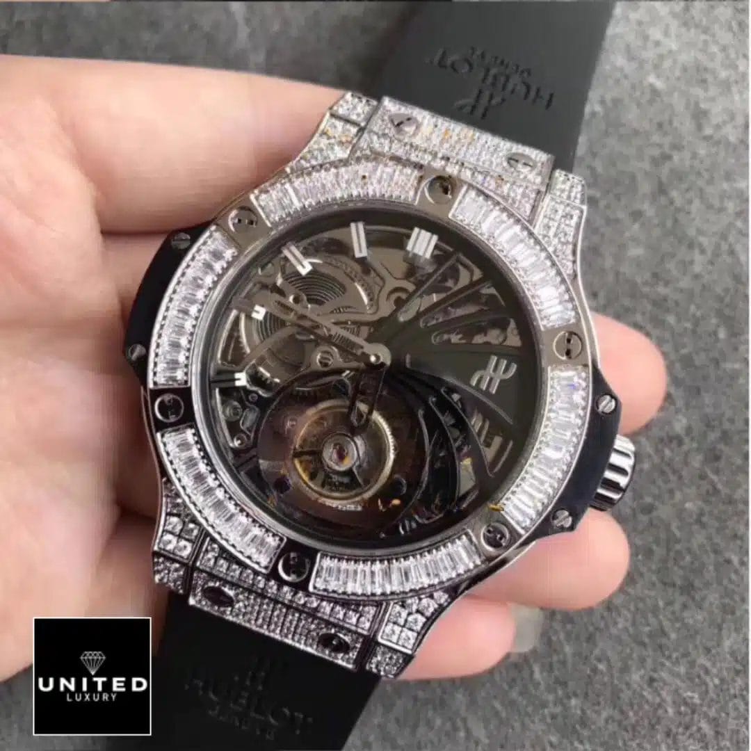 Hublot Skeleton Diamond Watch Replica on the hand view grey background