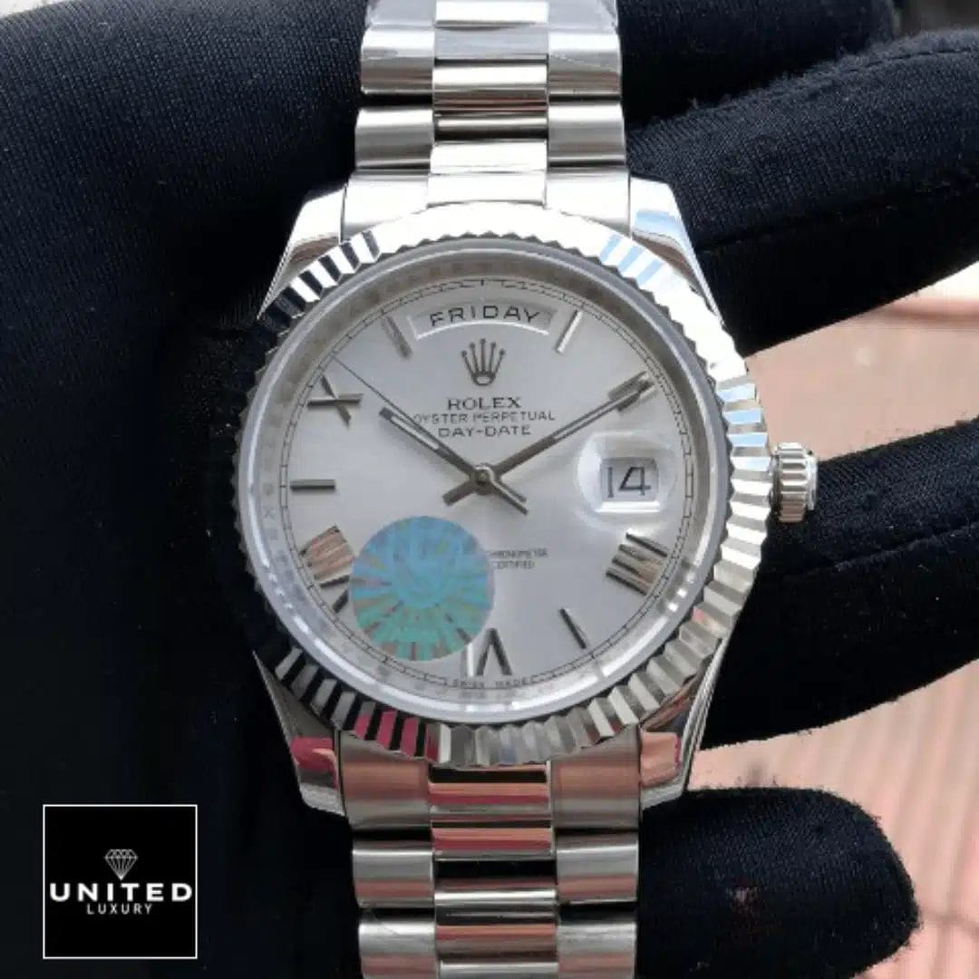 Day-Date 228239 Roman Fluted Bezel White Dial Replica on the hand
