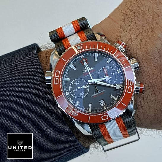 Omega Seamaster Orange Bezel Replica on the man wrist