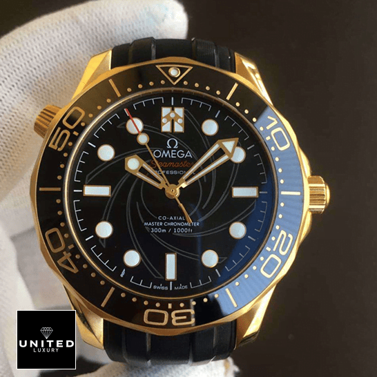 Omega Seamaster Black Dial Gold Bezel Replica on the hand