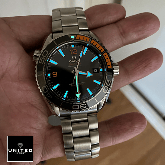 Omega Seamaster Black Dial Oyster Replica on the hand