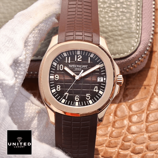 Patek Philippe Aquanaut Brown Dial Rose Gold Case Replica on the hand