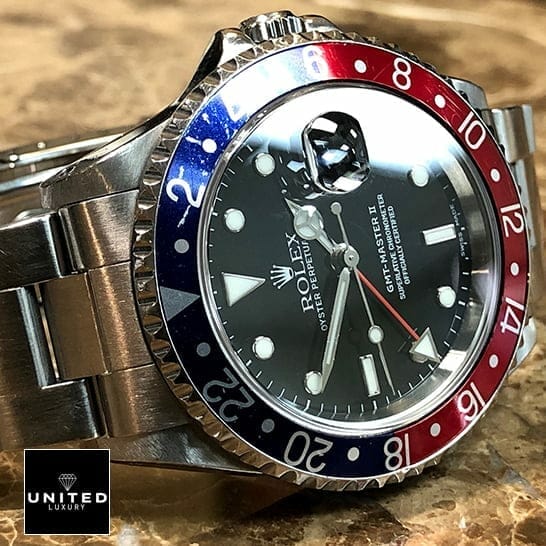 Rolex Submariner GMT-Master II Red & Blue Bezel 16710 Oyster Replica on the Table