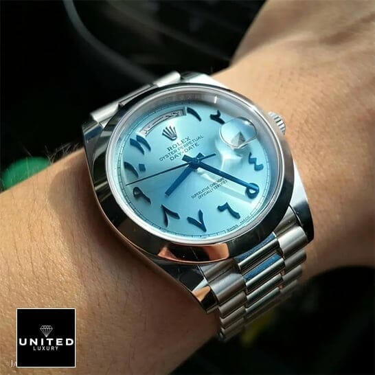 Rolex DayDate 40 228206 Turquoise Dial Replica on his arm
