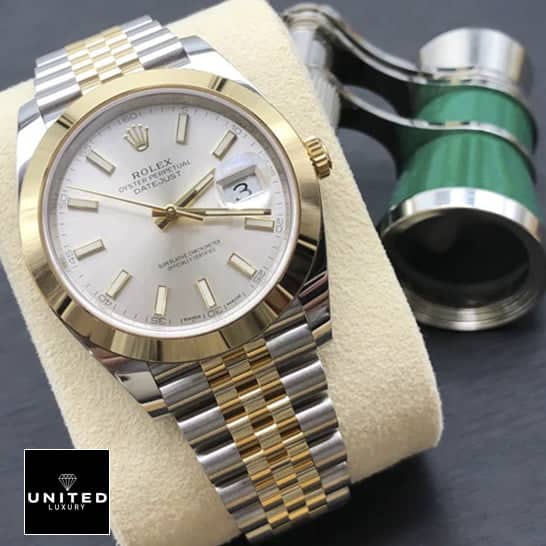 Rolex Datejust 41 126303-0002 Replica watch on cushion on the table