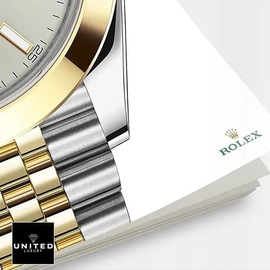 Rolex Datejust 41 126303-0002 Replica Silver Dial Gold Bezel Two tone Bracelet and on the Rolex notebook