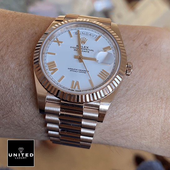 Rolex Day-Date President 118235f-0024 Rose Gold Fluted Bezel Replica on his arm