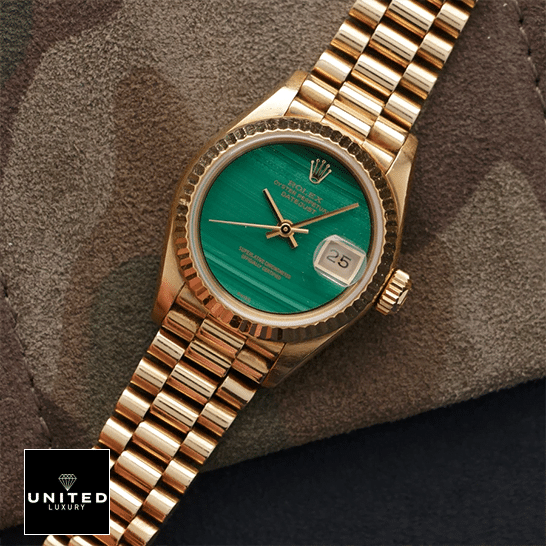Rolex Datejust 69178 Yellow Gold Oyster Bracalet & Fluted Bezel Replica in the table