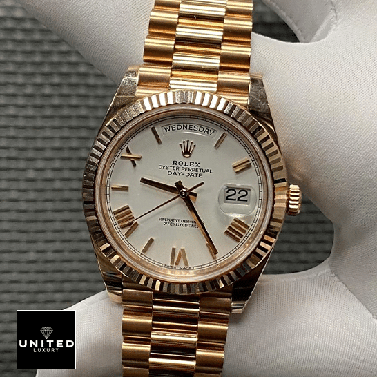 Rolex Day-Date 228235 Roman Gold Oyster Bracelet Replica on the hand