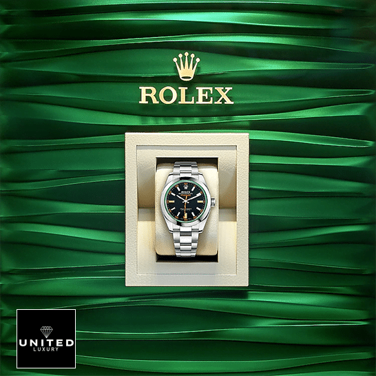 Rolex milagauss 116400GV Replica in the rolex box and green background