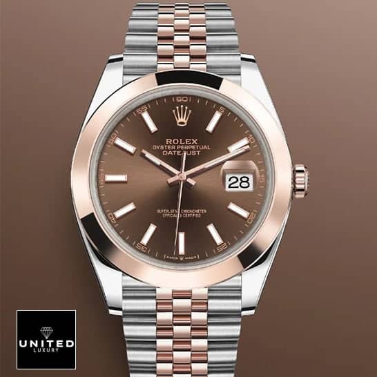 Rolex datejust everose gold replica jubilee bracelet and brown background